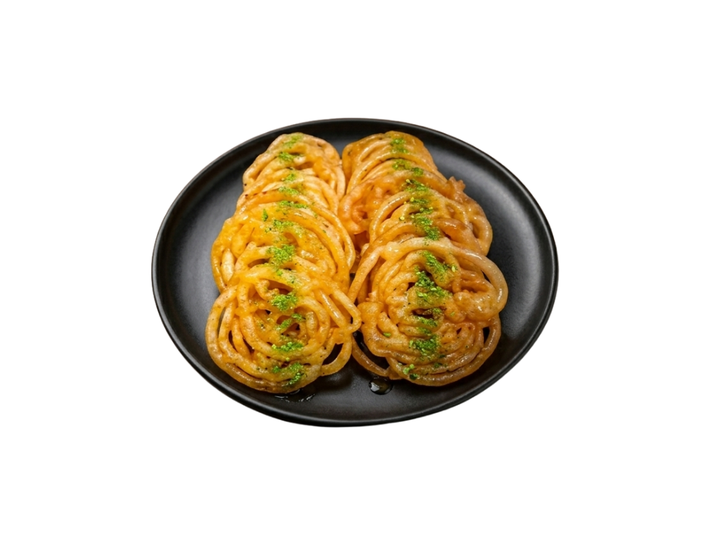 Gelabi, típico dulce persa con pistacho y miel